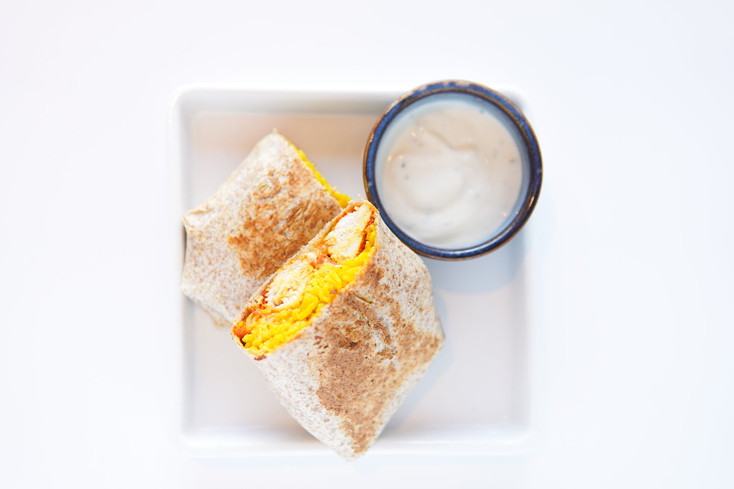 Chicken Tikka Burrito with a Zesty Sour Cream Dip